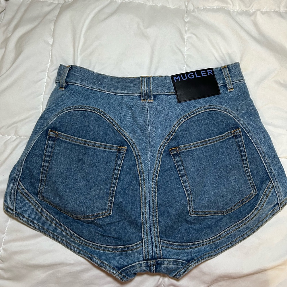 Mugler Spiral high-waisted denim shorts